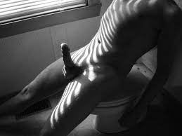 File:Black and white nude man on toilet.jpg - Wikipedia