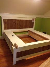 They went to ikea and purchased kitchen cabinets as the base of the bed. 10 Ways To Make Your Own Platform Bed With Storage Craft Coral Bed Frame With Storage Bed Frame With Drawers Diy Platform Bed
