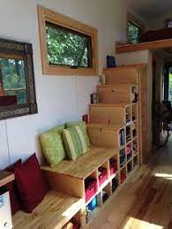 Woman S 246 Sq Ft Nanostead Tiny Home On Wheels Tiny House Stairs Tiny House Interior Tiny House Design
