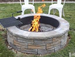 Add a spark screen and a base to catch the embers and you're on your way with a pit that costs less than $100. Diy Backyard Fire Pit Her Tool Belt