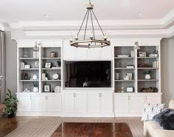 The collection include many items like different shelf elements, hanging drawer containers with invisible. White Living Room Built In Shelves With Backs Painted Charcoal Gray Transitional Li Built In Shelves Living Room Living Room Built Ins Living Room Cabinets