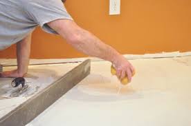 How To Level A Subfloor Before Laying Tile How To Lay Tile Flooring Basement Flooring