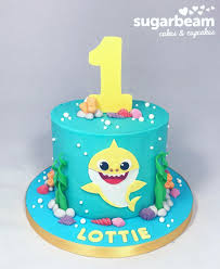 Cake by deliciousbysara | love this cake idea, order cake from deliciousbysara. Pin By Dominique Rose On Party Ideas Baby Birthday Cakes Shark Birthday Cakes Baby First Birthday Cake