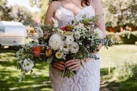 Wedding flower delivery is available for bride and bridesmaid bouquets. Intimate And Casual Lyons Farmette Wedding