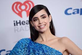 Sofia carson's elegant golden globes 2021 anchor look, wearing in a big bow and hair up in a beehive (i.imgur.com). Who Is Sofia Carson Popsugar Celebrity