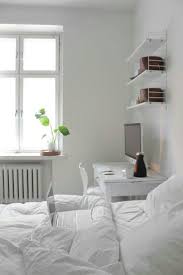 Like The Use Of The Shelves Above The Desk Next To The Bed All White Room Clean Bedroom White Rooms