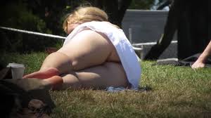 Thick girls upskirt while she relaxes on park grass - Voyeurs HD
