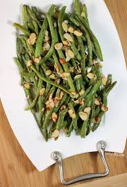 Garlic Roasted Green Beans With Almonds Emily Bites Recipe Green Bean Recipes Green Beans With Almonds Veggie Recipes