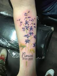 Larkspurs are the traditional annual flowers known for their tall spires. Larkspur Flower By Walker Sparks At Lost Soul Tattoo In Hampstead Nc With My Daughter S Name And Birthday Tattoos