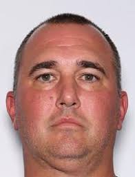 A high school football coach wanted for child pornography offenses has been  missing for over a month. Here's what we know