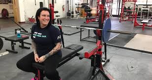 women to give powerlifting
