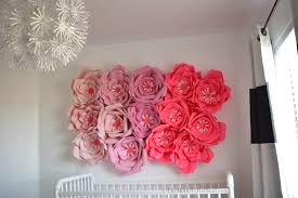 Elegant diy paper roses and satin bows on a crib with tufted upholstery and dupioni silk baby bedding with ruffles. Baby Nursery Pink Black White The Mother Overload