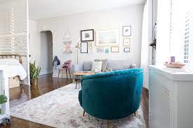 A 500 Square Foot Nyc Studio Has An Ingenious Room Divider Studio Apartment Layout Living Room Furniture Layout Apartment Layout