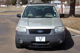 Image result for Gold Ash 2005 Escape