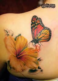Some of the tattoos that symbolize feminism are butterfly and flower tattoos, so read on to know all about their significance and designs. 3d Butterfly With Flower Tattoo On Back Shoulder