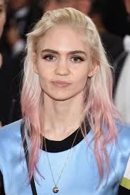 Grimes is no stranger to radical and unusual art. Grimes Has A New White Ink Back Tattoo To Resemble Alien Scars