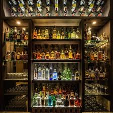 The Secret Door That Takes You To The Best Little Speakeasy In Iowa Basement Bar Designs Wine Shop Interior Home Bar Designs