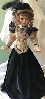 Hair on the doll would have been taken from the body of the deceased. Beautiful Porcelain Doll Dressed In Victorian Era Fashion Victorian Era Fashion Doll Dress Dresses