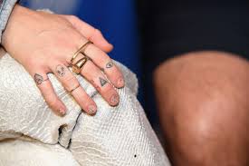 Miley cyrus' tattoos & meanings | steal her style. Miley Cyrus Tattoos Lookbook Stylebistro