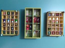 Fix them with glue and put some plant leaves into them. Upcycle Shot Glass Display Cases That I Made From Coke Crates And A Wine Crate Shot Glass Display Glass Display Shelves Diy Display