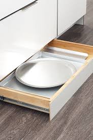 If you get a flush toe end for the base cabinet how do you finish the corner with molding so that you don't see the toe kick end? Toekick Drawer With Push To Open Guides Diamond