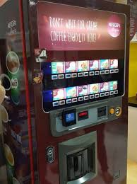 Nescafe coffee vending machines pioneered the coffee vending industry in the early 1990's and the red and black lioness nescafe vending machine has become synonymous with vending machines worldwide. Vending Machines Way Forward New Nestle Nescafe Alegria Avm Mini Me Insights