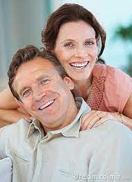 Middle Aged Couple Posing With Hand In Hand Older Couple Poses Older Couple Photography Age Photography