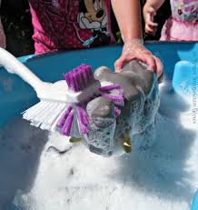 Sensory bins can help children learn about other naters is 47 months old. Animal Washing Sensory Play For Toddlers Where Imagination Grows