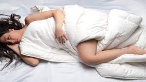 Do you keep a pillow between your legs while sleeping? Here is what it  means | The Times of India