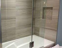 Katherine sorrell inspiration for a small coastal ensuite bathroom in cornwall with white walls, pebble tile flooring, wooden worktops, beige floors, brown worktops, freestanding cabinets. Sexy Condo Small Bathroom Remodel Otta Decorate