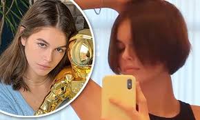 Women were going back to work, they were assuming their own power. Kaia Gerber Cuts Thick Auburn Tresses Even Shorter And Jokes Can T Seem To Keep My Hair On My Head Daily Mail Online