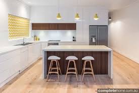 More Timber And White Simple Pendants Over Island White Modern Kitchen White Gloss Kitchen Kitchen Layout