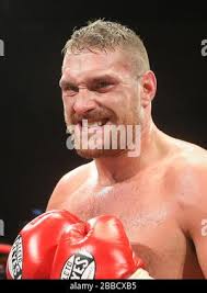 Tyson Fury (gold shorts) defeats Rich Power in a Heavyweight boxing contest  at York Hall, Bethnal Green, promoted by Hennessy Sports