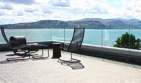 Would you imagine a piece of design that is heavily endowed with mahogany products? Glass Railing Systems Aquaview Fencing