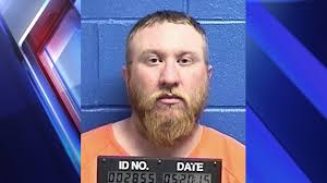 Man charged with rape while free