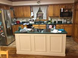 Painting kitchen cabinets rejuvenates your home. Painting Kitchen Cabinets In Log Home