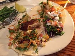 Maybe you would like to learn more about one of these? Fish Tacos With Small Piece Of Fish Surrounded By Filler Picture Of Houlihan S Chanhassen Tripadvisor