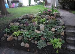 Pin By Georgiana Sanders On Outdoors Rock Garden Landscaping Landscaping With Rocks Sloped Backyard Landscaping