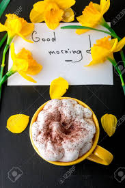 The ritual of having a coffee and a smoke to relax and refresh isn't necessary for physical survival, but may be for mental. Coffee Mug With Yellow Daffodil Flowers And Quotes Good Morning Stock Photo Picture And Royalty Free Image Image 77534088