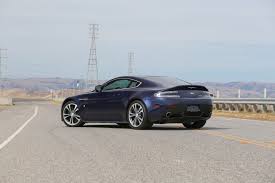 Image result for Midnight Blue 2011 Aston Martin