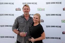 Alicia Allain’s husband John Schneider will honor his wife’s memory with a “Hug those you love” campaign.