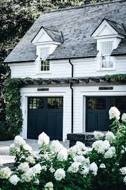 Black And White House Exterior One Story Pin By Nina Allen On Dream House House Exterior Black Garage Doors Farmhouse Exterior