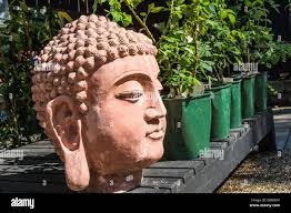 Clay buddha statue hi-res stock photography and images