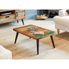 A table is a versatile piece of furniture, often multitasking as dining, working, studying, gaming, and living area. Rustic Coffee Table Recycled Reclaimed Painted Boat Wood Black Metal Legs