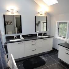 White cabinets, white counter, white subway tile (break up the white with wood cutting boards and other kitchen decor) as a kitchen specialist i will tell you this, any type of countertop can look good with cherry cabinets. Bathroom Renovation Amica Modern High Gloss White Black Countertops Kitchen Cabinets Leicht New York