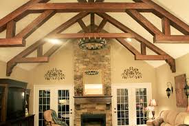 A craftsman home will have a grid of beams making squares, and this is often called a craftsman style coffered ceiling. Faux Wood Beam Ideas For Vaulted Ceilings