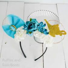 With roses all around the front (only) & large flat bow! These Diy Floral Jasmine Minnie Ears Are Stunning