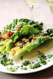 When lime and cilantro come together with fish, a mouthful of exquisite flavour is born. Fish Tacos With Salsa Verde In Lettuce Wraps