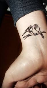 Birds On A Branch Tattoo Watching Over You Hand Tattoos Wrist Tattoos Bird Tattoo Wrist