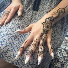 Other than the elephant, the artist also shows small flowers at the fingers above the tattoo. Henna Tattoo Designs Origin Popular Motifs And Their Meaning